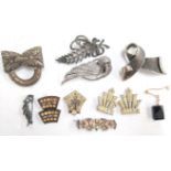 Various brooches and clips including one silver with marcasites, a Victorian silver brooch inlaid