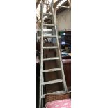 A vintage wooden folding step ladder, approximately 2.5mH