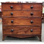A 19th century mahogany chest of two short over three graduating cockbeaded drawers, on swept