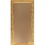 A small metal framed wall mirror, 59x31cm