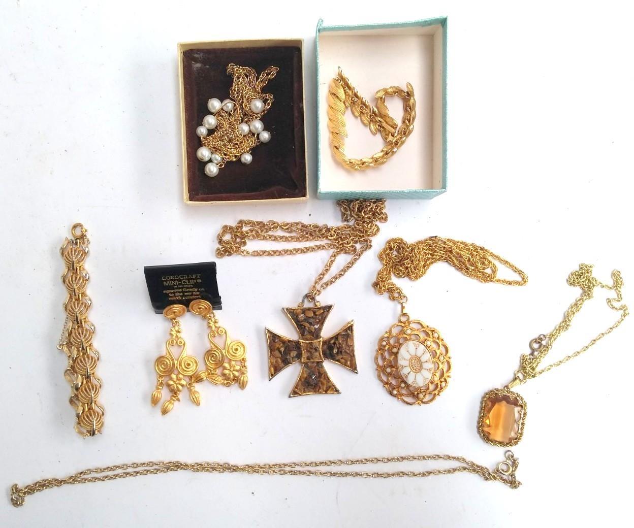 Selection of yellow metal costume jewellery to include pendants, bracelets and earrings