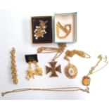 Selection of yellow metal costume jewellery to include pendants, bracelets and earrings