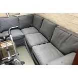 A large grey corner sofa, each side approximately 240cmL