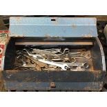 An Enox metal toolbox, containing a quantity of spanners and a pair of mole grips