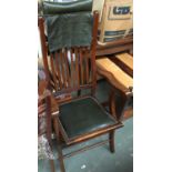 A Victorian folding campaign chair, with adjustable leather head rest