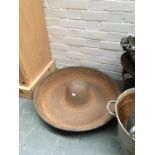 A "Mexican hat" cast iron feeder, approx. 70cmD