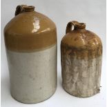 Two large stoneware flagons with loop handles, stamped 'W H Chick, Wine & Spirit Merchant