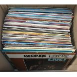 A mixed box of vinyl LPs, mainly jazz and other music from the 1970s