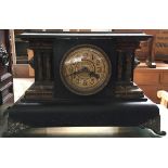 A mock-marble wooden mantel clock, with ormolu mounts, electric movement, 29cmH