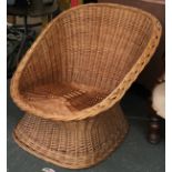 A 1970s wicker armchair