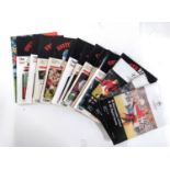 A collection of 21 Manchester United football programmes, mainly United Review and UEFA Champions