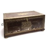 An Indian metal clad coffer, in Antique style, 20th century, the hinged cover opening to fabric