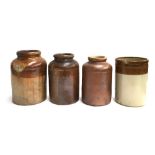 Four large stoneware storage jars, the largest 28cmH