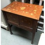 A marquetry and mahogany side table, having two cupboard doors and drawer below, on fluted square