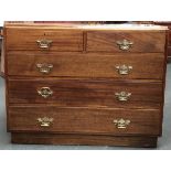 A 20th century oak chest of two short over two long drawers, on plinth base, 107x51x84.5cmH