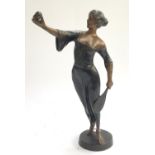 An Art Deco style bronze sculpture of a woman playing tennis, 40cmH