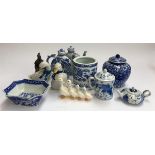 A mixed lot of oriental and other blue and white ceramics, to include several teapots, ginger jar,