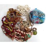 Mixed lot of costume jewellery, mostly bead necklaces and loose beads