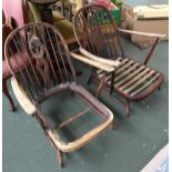 A pair of Ercol low stick back open armchairs, in need of re-upholstering