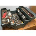 A vintage toolbox containing a quantity of bolts and screws etc
