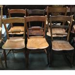 A matched set of four 19th century kitchen chairs; together with a matching rocker, and carver (6)