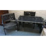 A cast iron garden table with wooden edge, 119x63x64cm; together with a pair of cast iron slatted