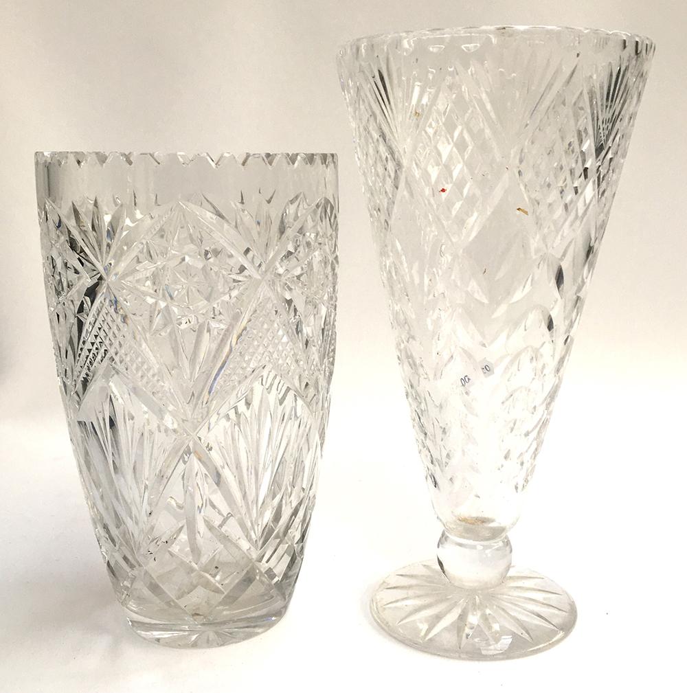 A crystal conical vase, 31cmH; together with a crystal vase with cut star design, 26cmH (2)