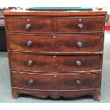 A 19th century mahogany bow front chest of two short over three long drawers, with shaped apron on