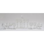 A quantity of glassware to include: four wine goblets with airtwist stems; six cut glass wine