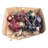 A box of various metal vintage meat grinders, to include Spong