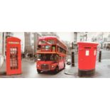 A photographic print of a London bus and post box, 51x122cm