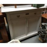 A painted pine cupboard/sideboard, moulded top above single drawer, over two cupboard doors,