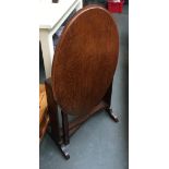 A folding oak oval side table, 75cmW