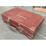 A Revelation vintage leather suitcase, the top inscribed 'Colonal H.P. Mackley', 67cmW