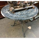 A cast metal garden table, 80cmD