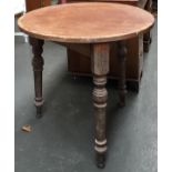 An unusual circular table, having three turned legs, 79.5x75cmH