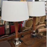 A pair of tapered oak table lamps, on square chromed bases, with shades, 51cm high to top of fitting