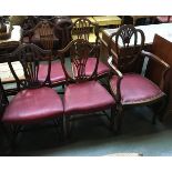 A matched set of five shield back dining chairs, one a carver