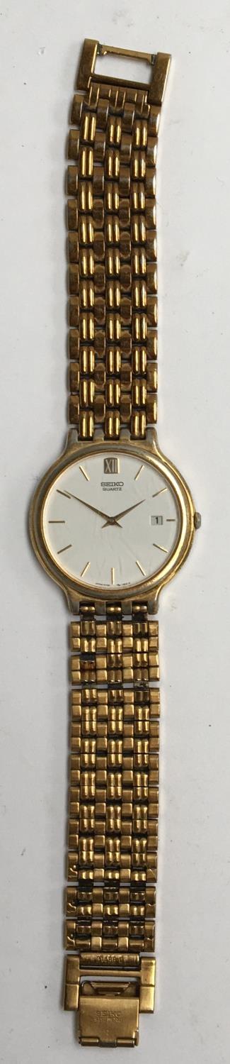 A gent's Seiko quartz wrist watch, white dial, 33mm