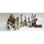 A number of ceramic and other figurines to include NAO, Valencia, Regal Bassano, etc