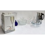 A small lot of glassware to include cut glass trifle dishes, eight boxed champagne flutes, plastic