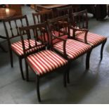 A set of six dining chairs, two carvers, with striped upholstered seats