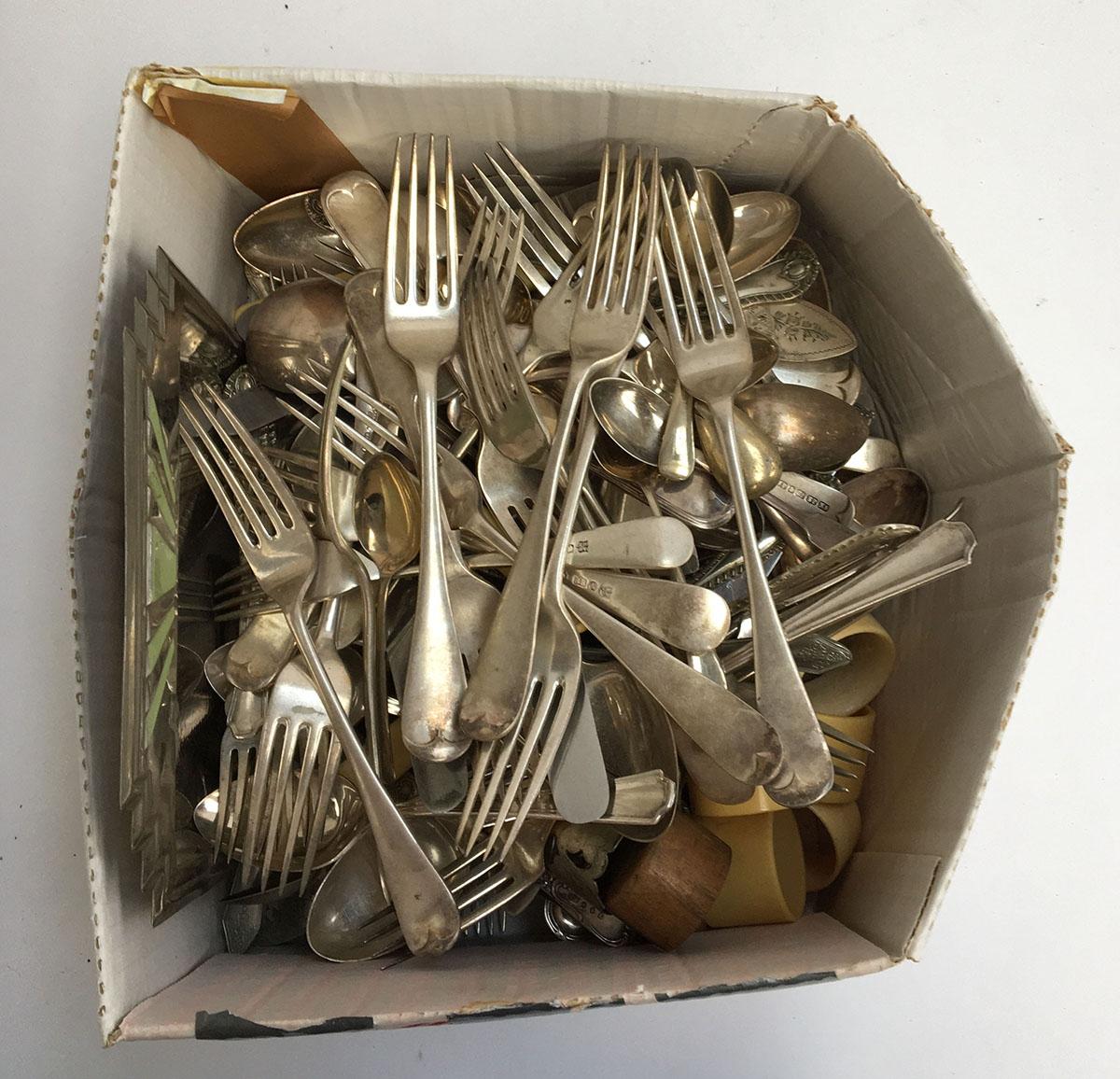 A large quantity of plated flatware together with bakelite napkin rings