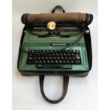 A Smith Corona Electra II portable electric typewrite in soft carry case