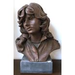 A resin bust of a young woman on slate plinth, approx. 51cmH