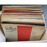 A box filled with LPs, to include Doctor Zhivago, Peter Nero, Jim Reeves, movie themes etc
