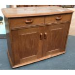 A mid century oak sideboard, two drawers above two cupboard doors, 92x46x71cmH