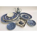 A lot of blue and white china, to include several meat plates, an Oriental teapot, plates etc