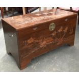 A carved camphor wood chest 101cmW