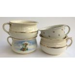 A pair of chamber pots with gilt decoration and two others
